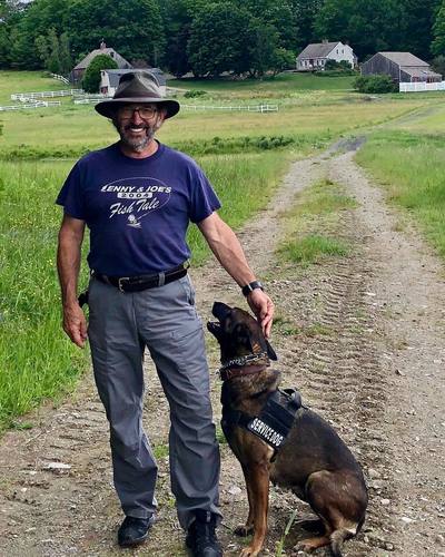 A veteran with his Limitless K9 service dog