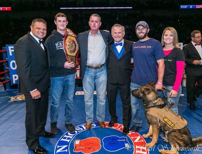 A Limitless K9 service dog at Guns & Hoses